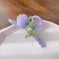 Elegant purple tulip hair claw with green ribbon bow and pearl on ceramic tray - Pearl Purple Hair Claw