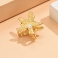 Elegant gold starfish hair claw clip with a central pearl in a minimalist sea style - Starfish Pearl