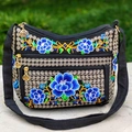 Ethnic style black canvas crossbody bag featuring blue floral embroidery and four layers - Blue Apple Blossom