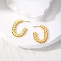 Detailed close-up of gold twisted rope C-shape hoop earrings on a minimalist white stand - 7# Oval Twisted Rope