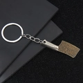 Portachiavi mini mannaia in metallo con trama Damasco e impugnatura in bronzo antico - Coltello B (Oro Antico)