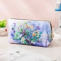 Portable large capacity makeup bag with blue floral print and golden zipper detail - Various Flowers
