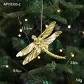 Golden dragonfly Christmas tree ornament with intricate wing details and hanging string - Dragonfly Style