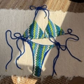 Three-color crochet bikini set with wave patterns and gold accents on blue ties - S / Blue