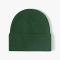 Deep green ribbed knit beanie with a wide cuffed design for winter warmth and comfort - One Size / Green