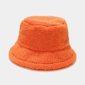 Close-up of bright orange plush bucket hat showing thick lamb wool texture and fabric - One Size / Orange