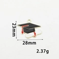 Detailed view of 28x23mm graduation cap and diploma pendant with size markings - Graduation Cap