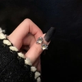 Artistic silver open ring featuring two iridescent moonstones on a textured band - Silver Ring
