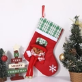 Red Christmas stocking with green plaid trim, white snowflake pattern and small bells - Long Legs Reindeer with Bell
