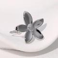 Elegant adjustable silver five-petal flower ring in polished stainless steel finish - Steel
