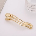 Eleganter Haarklammer aus Goldmetall mit Wellendesign und Hammerschlag-Textur - Gehämmertes Gold