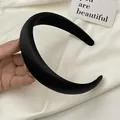 Minimalist thick black satin headband featuring a padded vintage style for women - Black