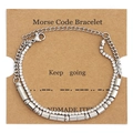 Detail of double-layer Morse code bracelet with rhinestones on a display card - Keep Going Silver