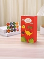 Red cartoon dinosaur gift bag with Little Dino print and 12 colorful matching stickers - Red