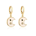 Detail of gold moon earrings with white enamel coating, star zircon, and black heart detail - White Enamel Crescent (42012)