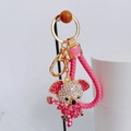Close-up of pink crystal koala keychain with gold metal ring and braided strap detail - Rose Red + Heart Lanyard / Rose Red