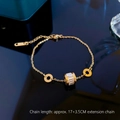 Goldenes Titanstahl-Armband mit römischen Ziffern und rechteckigem Kristallanhänger - Gold