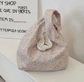 Detailed close-up of pink floral cotton handbag with lace trim and checkered lining - Colorful Floral