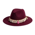 Detail of burgundy wide brim fedora hat with bohemian tassel and shell decorative band - Burgundy