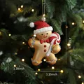 Christmas gingerbread man hanging ornament with red glitter hat and candy cane decoration - Gingerbread Man