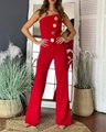Detail of red strapless jumpsuit featuring elegant large gold decorative buttons - S / Red