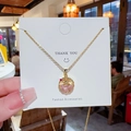 Goldene Titanstahl-Halskette mit rosa und champagnerfarbenem Kristallanhänger - Facettenkristall Runder Stil (X447) / Gold
