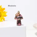 Mini mushroom pendant carved from natural Rhodonite gemstone with a gold metal loop - Rhodonite