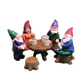 Miniature garden gnome set with four colorful figurines and tiny resin furniture - 6-Piece Set