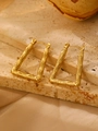 Gold bamboo-textured rectangular hoop earrings displayed on a rustic beige travertine stone - 18K Gold Square (0494)
