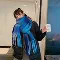 Blue gradient thick winter scarf with long tassels worn with a black down jacket - Blue Gradient