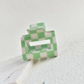 Macro detail of medium acetate checkered hair claw clip in green and white colors - Green/White 5cm Grid Clip