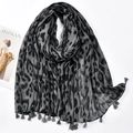 Detailed close-up of leopard print scarf with soft tassels and woven fabric texture - Grey Black Leopard (XB1068-01)