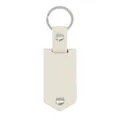 Minimalist cream leather keychain with silver metal rivets and elegant pointed end design - Off White