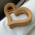 Pinza de pelo marrón mate en forma de corazón con diseño hueco y dientes de peine - Aprox. 6,5 cm / Corazón Caqui