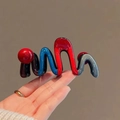 Colorful wave-shaped acrylic hair claw clip with glossy multi-color splice finish - Color Block Wave M-Shape Clip