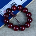 Dark red rosewood prayer beads bracelet with 11 polished wooden beads and woven knot - Colored 20mm*12 Beads