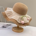 Straw sun hat with lace brim and pink tulip pendant on a wooden stand - Khaki Tulip Ornament