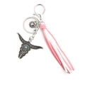 Bohemian bull skull keychain with turquoise stone and pink suede tassel on white - Pink White