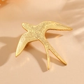 Polished gold swallow bird brooch with detailed feather engraving for suits and jackets - Gold (S001)