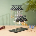 Macro view of clear acrylic earring organizer with glittery mini clothes hangers - Double Layer Starry Black