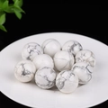 Set of 10 white turquoise stone round beads with grey texture on a white plate - White Turquoise