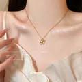 Elegant gold titanium steel necklace featuring a hollow flower pendant with zircon detail - Hollow Diamond Lady Style (X1778) / Gold/Five-Petal Flower