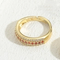14K gold plated ring featuring three rows of red and white cubic zirconia stones - Red Zirconia