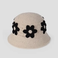 Handmade crochet bucket hat in cream white featuring elegant black floral patterns - Beige