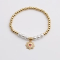 Bracciale di perle placcato oro con perle bianche e ciondolo a stella con cuore rosso - Ciondolo Ottogramma / Oro
