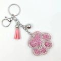 Pink rhinestone cat paw keychain with silver bell and stylish leather tassel charm - Pink