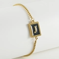 Golden box chain bracelet featuring a black enamel letter J pendant with dotted borders - J-Black