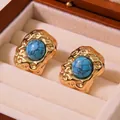 Vintage style gold earrings with irregular hammered texture and round blue turquoise insets - Vintage Turquoise Look Style (FYD6107-blue)
