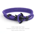 Detail of hand-knitted purple Milan line bracelet with a black sea turtle charm - Purple