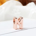Polished rose gold letter M bead for DIY charm bracelets on white lace background - Letter M / Rose Gold